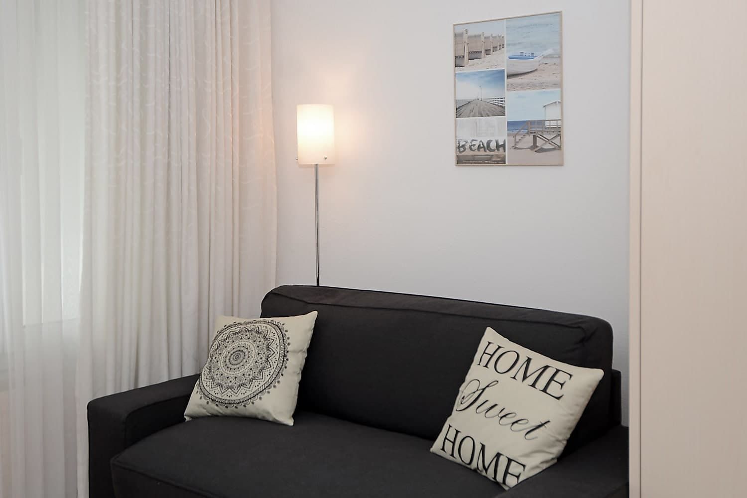 Ansicht Sitzecke mit Sofa - Ferienwohnung Studio 25 - Haus Green - Davos Platz