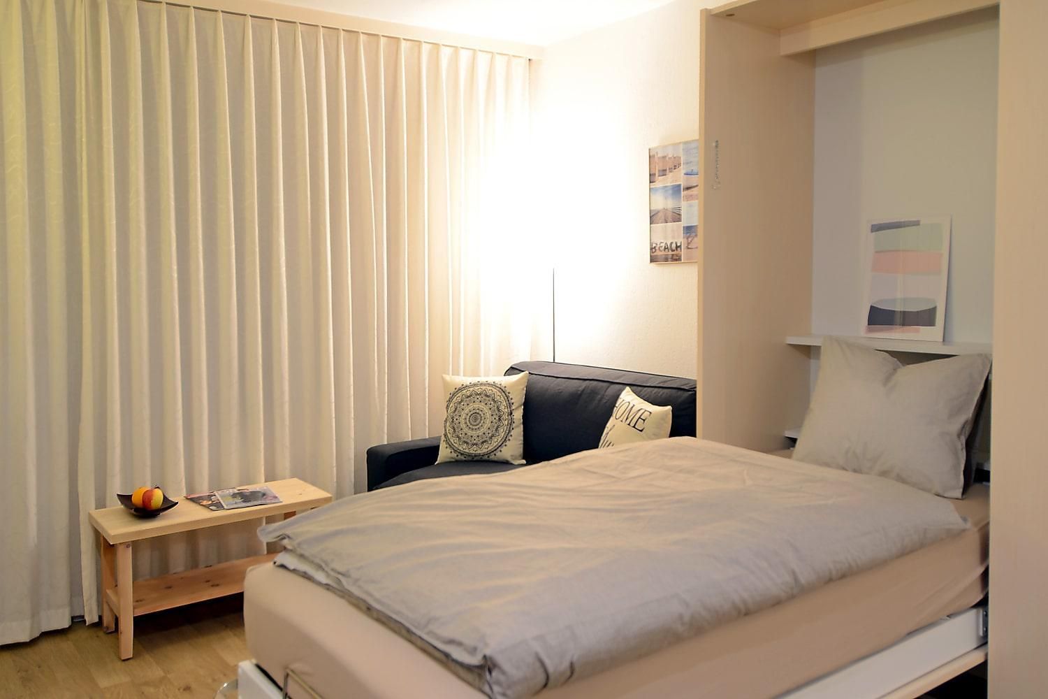 Einzelbett mit Sofa - Ferienwohnung Studio 25 - Haus Green - Davos Platz